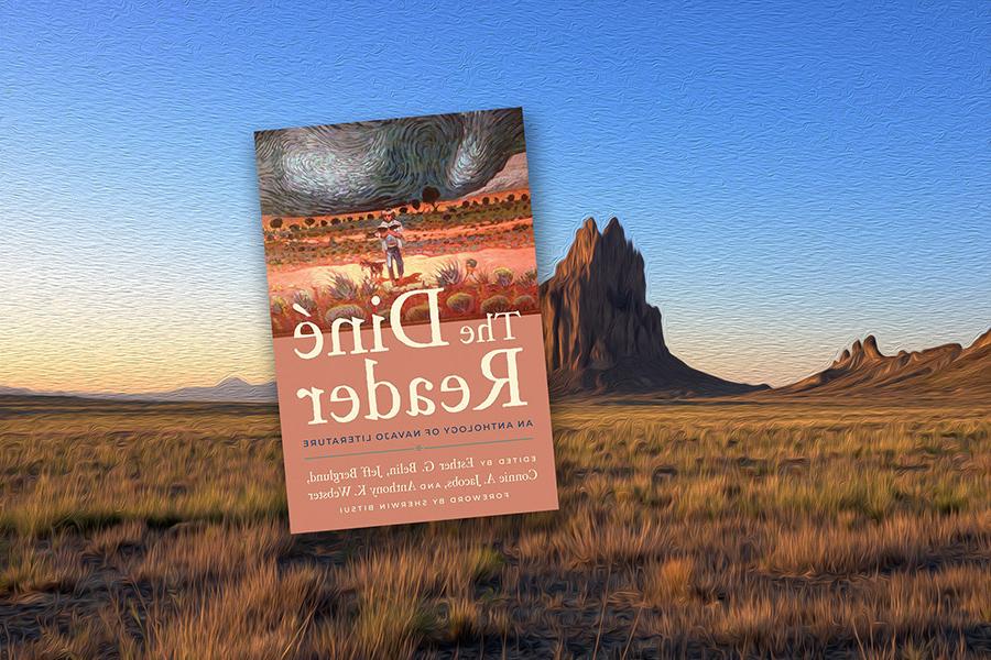 The Dine Reader book cover hovers over an image of the Shiprock.